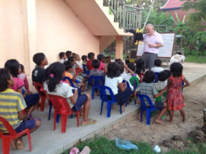 Joe Crow and Peter sharing the tract in the village